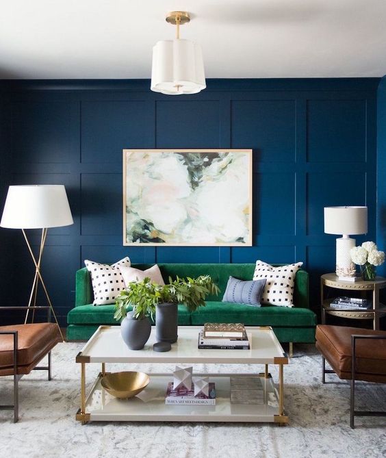 Here is navy working well with a green sofa. Laurel Home Blog article: The Worst Decorating Mistake You’re Most Likely Making